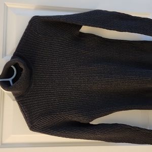Jeanne Pierre cable knit turtleneck sweater.